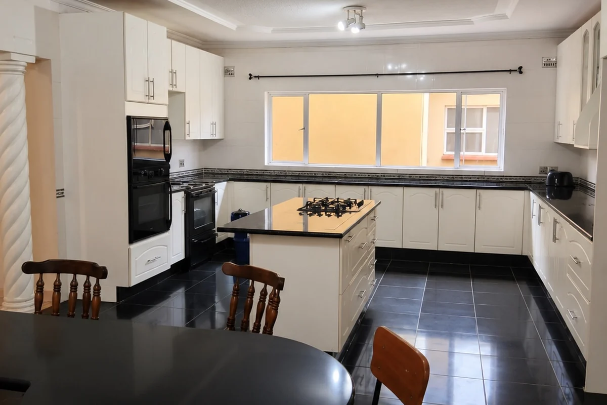 The kitchen and dining area of the Privian Academy boarding house