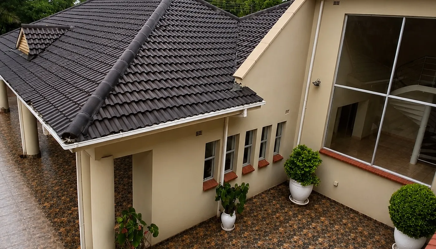 The Privian Academy courtyard seen from above, tiled paving between the buildings